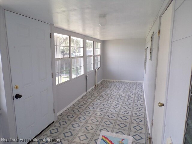 view of unfurnished sunroom