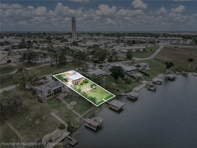 drone / aerial view featuring a water view