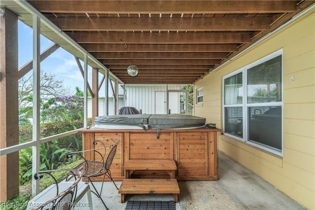 view of patio with a hot tub