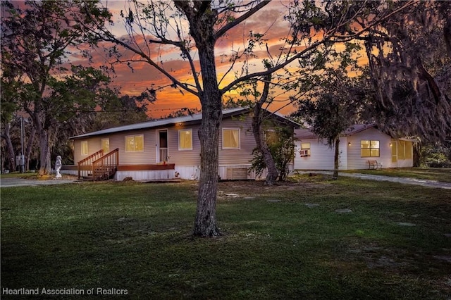 119 Mini Rd, Sebring, FL 33870 - view of front of property with a front lawn