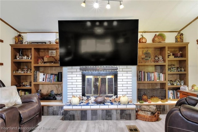119 Mini Rd, Sebring, FL 33870 - living area with wood finished floors and crown molding