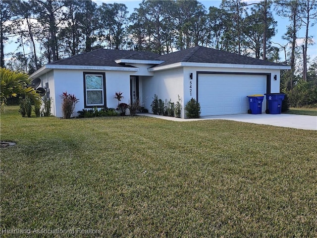 ranch-style home with a garage and a front yard