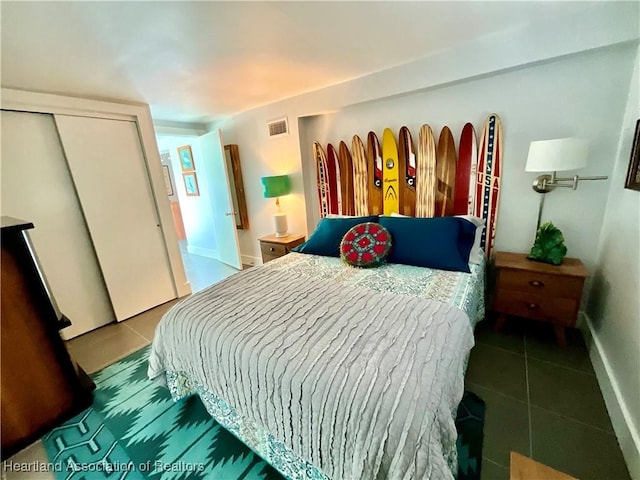510 Lake June Rd, Lake Placid, FL 33852 - bedroom featuring a closet and tile patterned flooring