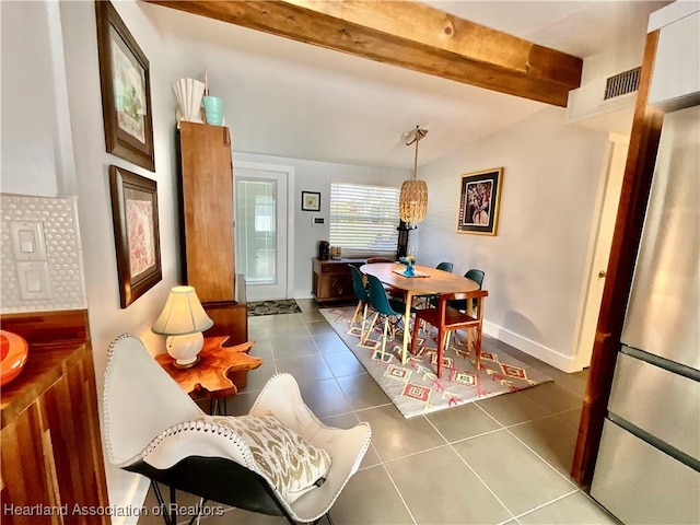 510 Lake June Rd, Lake Placid, FL 33852 - tiled dining room with a chandelier and lofted ceiling with beams
