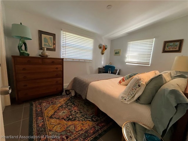 510 Lake June Rd, Lake Placid, FL 33852 - tiled bedroom with lofted ceiling