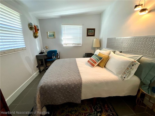 510 Lake June Rd, Lake Placid, FL 33852 - bedroom with dark tile patterned floors