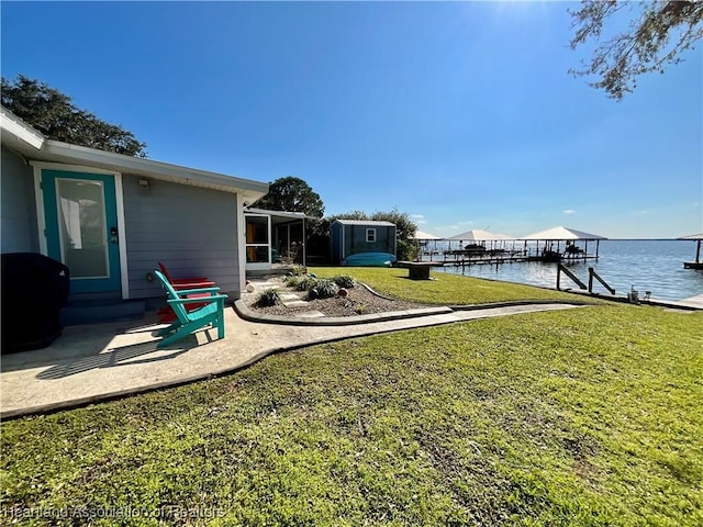 510 Lake June Rd, Lake Placid, FL 33852 - view of yard with a boat dock and a water view