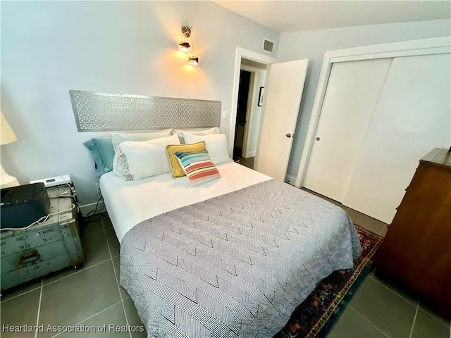 510 Lake June Rd, Lake Placid, FL 33852 - tiled bedroom with a closet