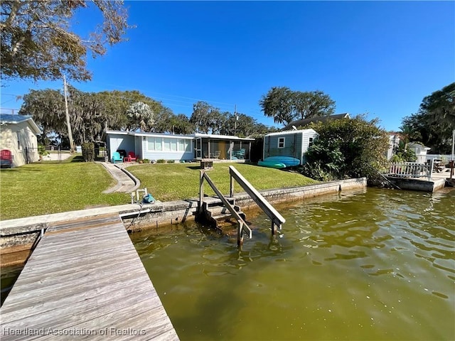 510 Lake June Rd, Lake Placid, FL 33852 - dock area with a yard and a water view