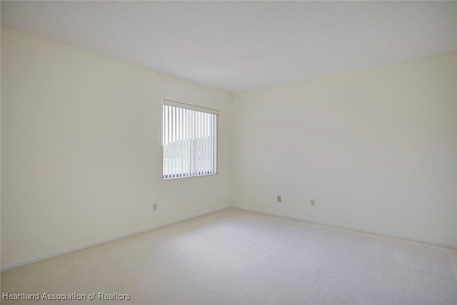 5544 Matanzas Dr, Sebring, FL 33872 - carpeted empty room with baseboards