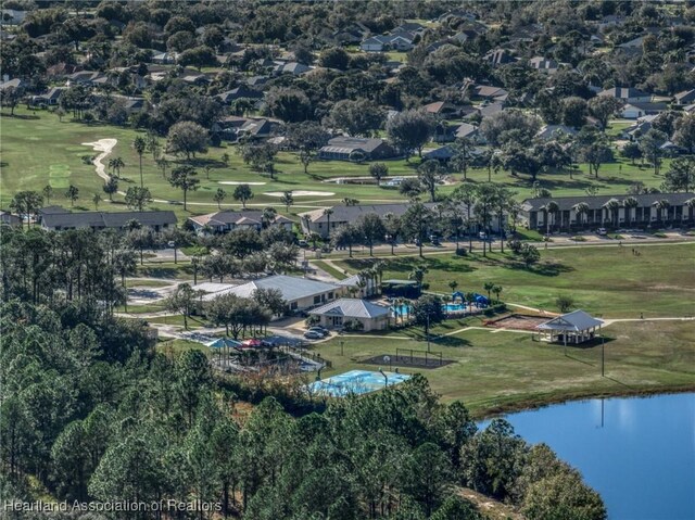 5544 Matanzas Dr, Sebring, FL 33872 - aerial view of property's location with a nearby body of water, a golf course, and a pool