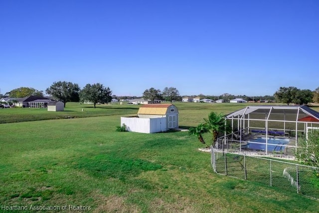 view of yard with a storage shed