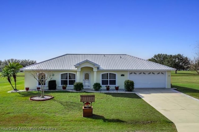 single story home featuring a garage and a front yard