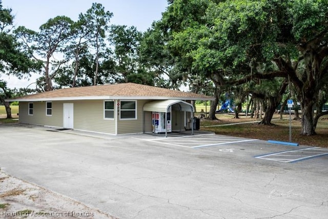 view of front of house with a carport