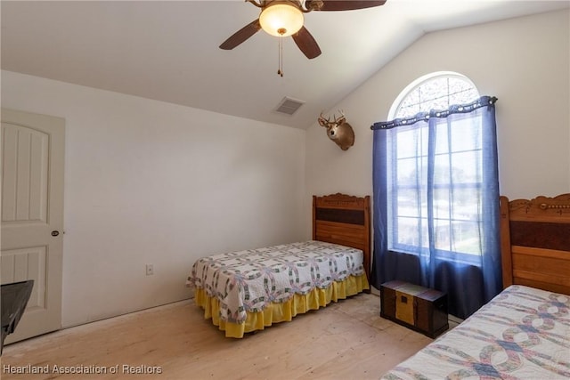 112 Wild Duck Pt, Lorida, FL 33857 - bedroom featuring vaulted ceiling, ceiling fan, and light wood-style floors
