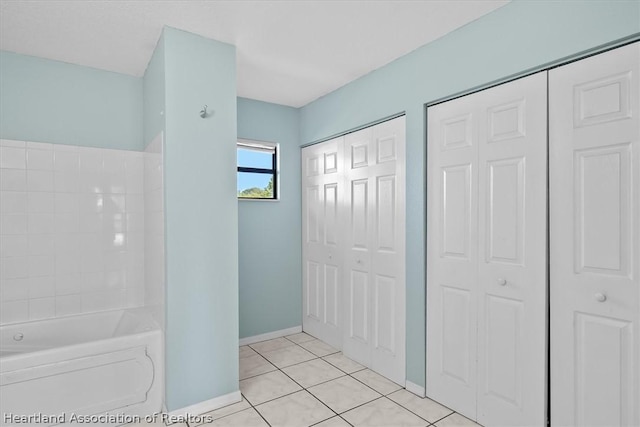 bathroom with shower / tub combination and tile patterned floors