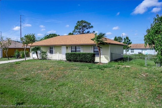 ranch-style home with a front lawn