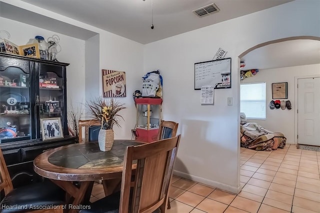 dining room with tile patterned floors