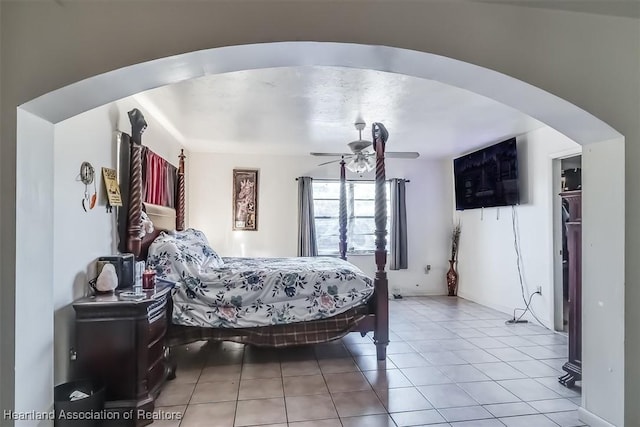 bedroom with light tile patterned floors