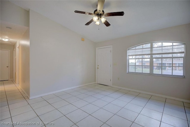 unfurnished room featuring light tile patterned floors and ceiling fan