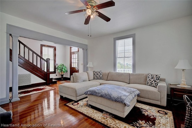 living room with ceiling fan and wood-type flooring