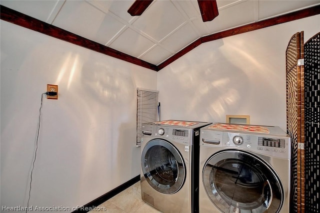 clothes washing area with separate washer and dryer