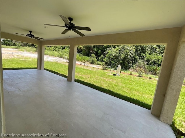 view of patio / terrace featuring ceiling fan