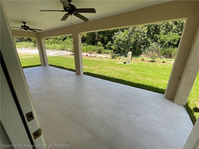 view of patio / terrace featuring ceiling fan