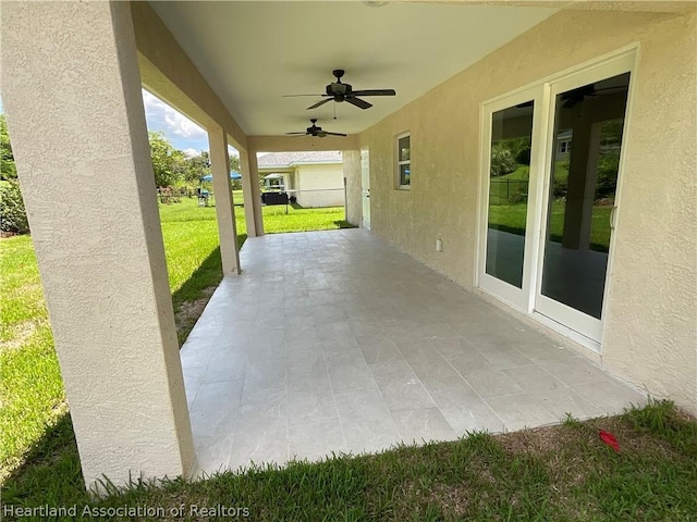 view of patio with ceiling fan