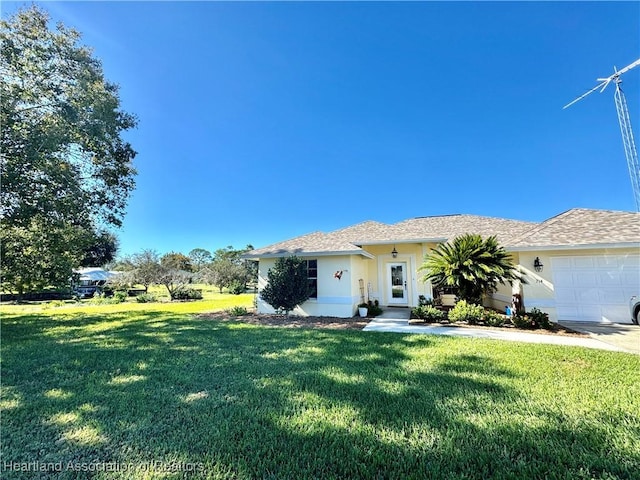 ranch-style house with a garage and a front yard