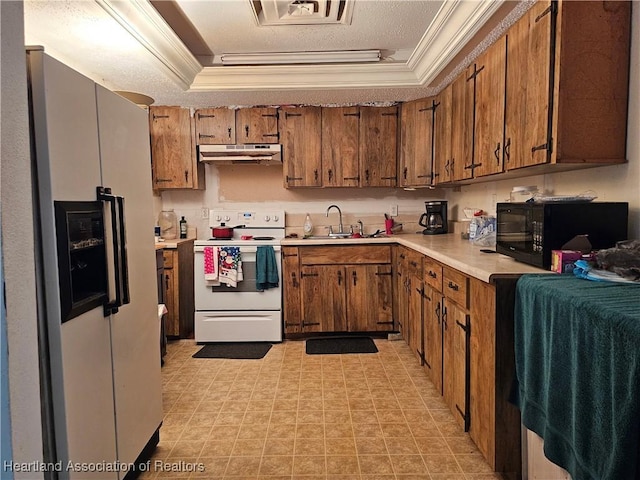 kitchen featuring refrigerator with ice dispenser, white range with electric cooktop, crown molding, and sink