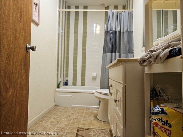 full bathroom with vanity, toilet, and shower / bathtub combination with curtain