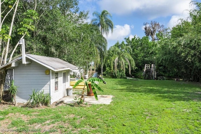 view of yard with a playground