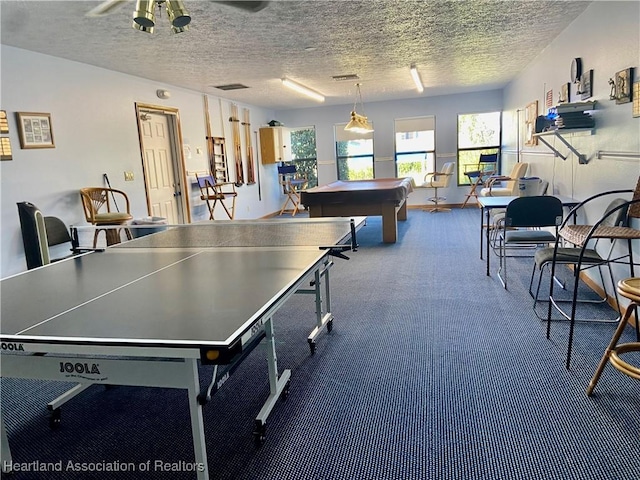 recreation room featuring a textured ceiling and billiards