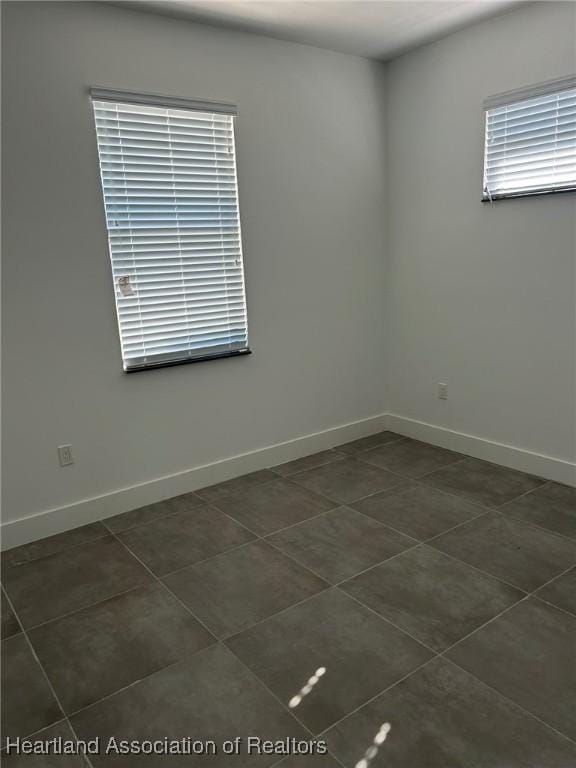 view of tiled spare room