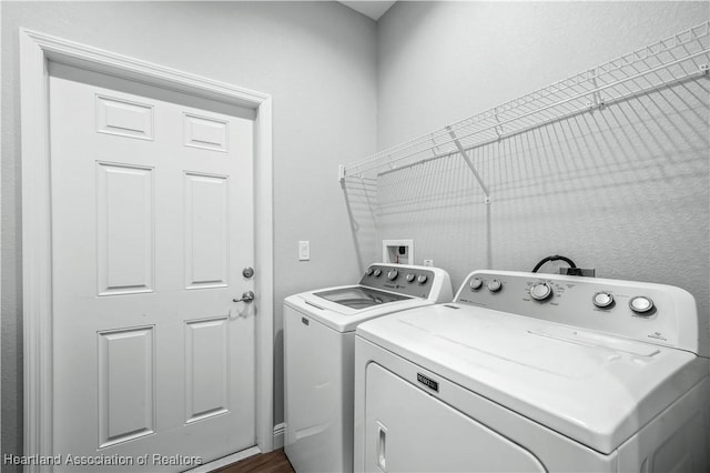 laundry area featuring independent washer and dryer