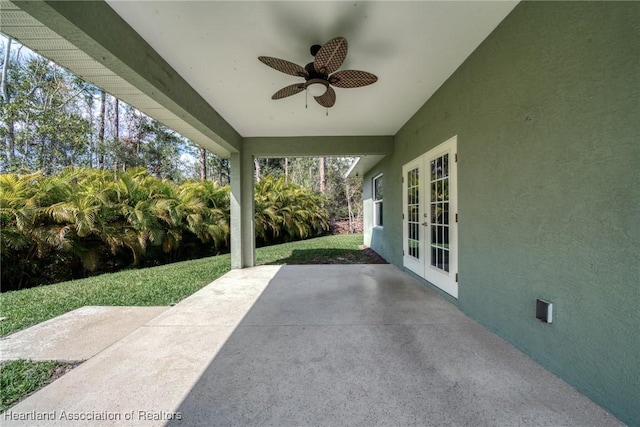 view of patio featuring french doors and ceiling fan