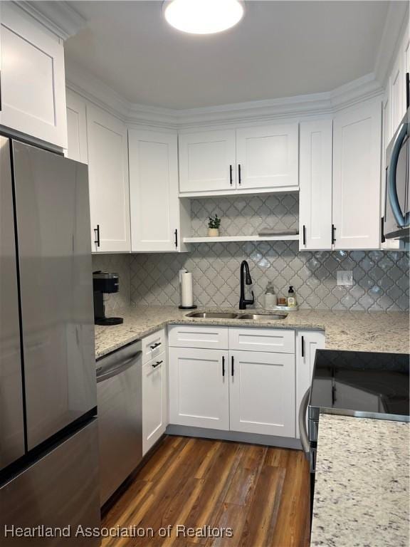 4350 Lakeview Dr, Sebring, FL 33870 - kitchen featuring white cabinets, dark wood-style flooring, appliances with stainless steel finishes, and a sink