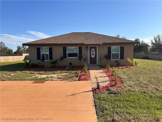 view of front of home with a front yard