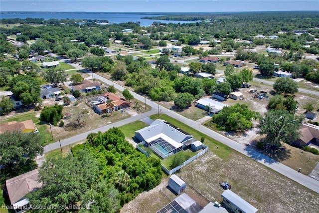 bird's eye view with a water view and a residential view