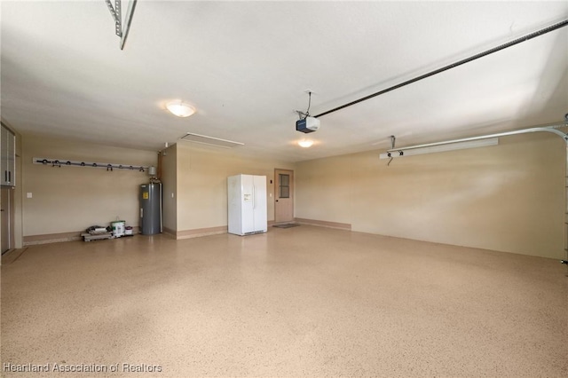 garage featuring a garage door opener, baseboards, white fridge with ice dispenser, and water heater
