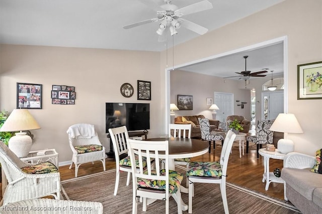 dining area featuring hardwood / wood-style flooring and ceiling fan