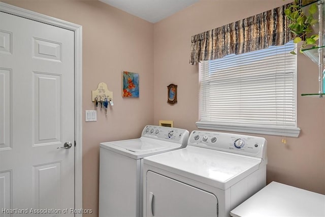 laundry room featuring washer and clothes dryer