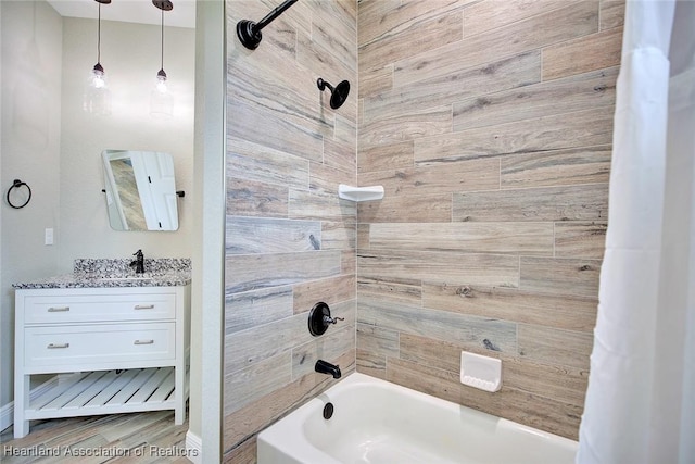 bathroom with vanity and shower / bath combination with curtain