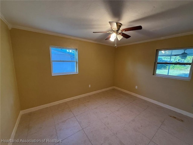 unfurnished room featuring ceiling fan, ornamental molding, and light tile patterned floors