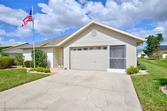 ranch-style home with a garage and a front yard