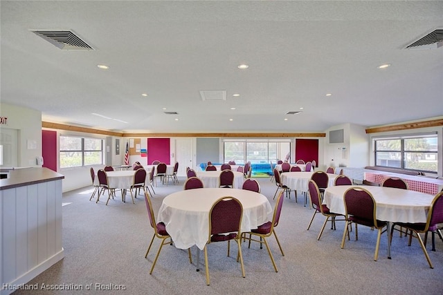 view of carpeted dining space