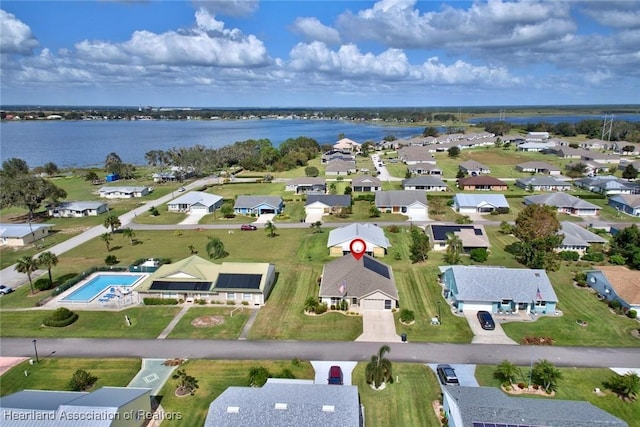 bird's eye view with a water view