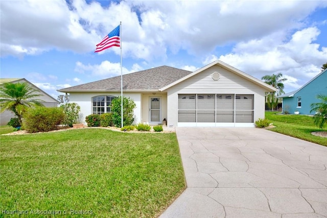 ranch-style home featuring a garage and a front yard