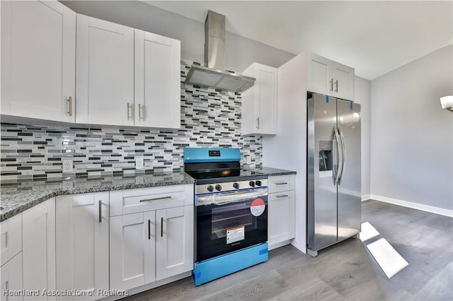 kitchen featuring backsplash, stainless steel appliances, island exhaust hood, white cabinets, and stone countertops